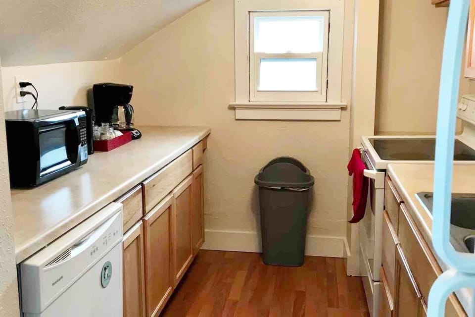 Fully equipped kitchen with all the necessities with complimentary coffee, cream, and sugar.