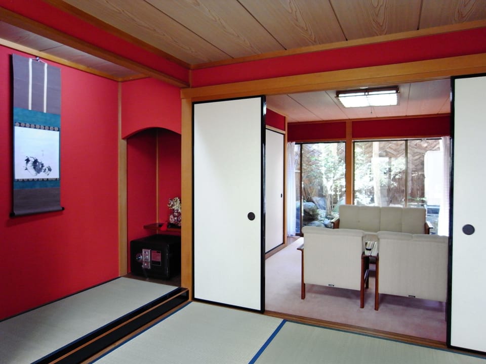 Japanese-Style Deluxe Room with Shared Bathroom | Living area | TV