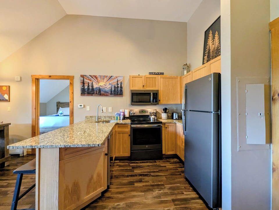 Your fully equipped kitchen makes it easy to prepare meals at your own pace, with granite countertops, modern appliances, and plenty of cabinet space to settle in and feel at home.