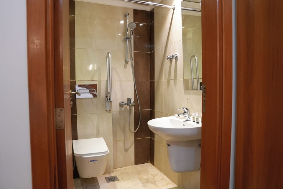 Hair dryer, slippers, towels, soap