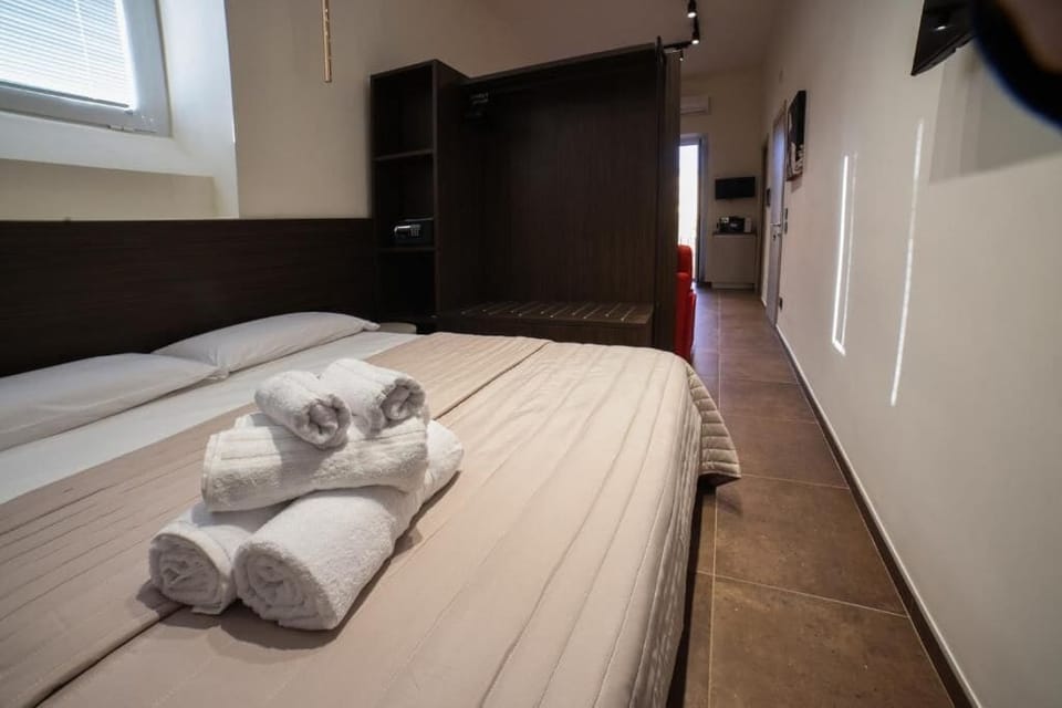 Family Room, Balcony, City View | In-room safe, blackout drapes, soundproofing
