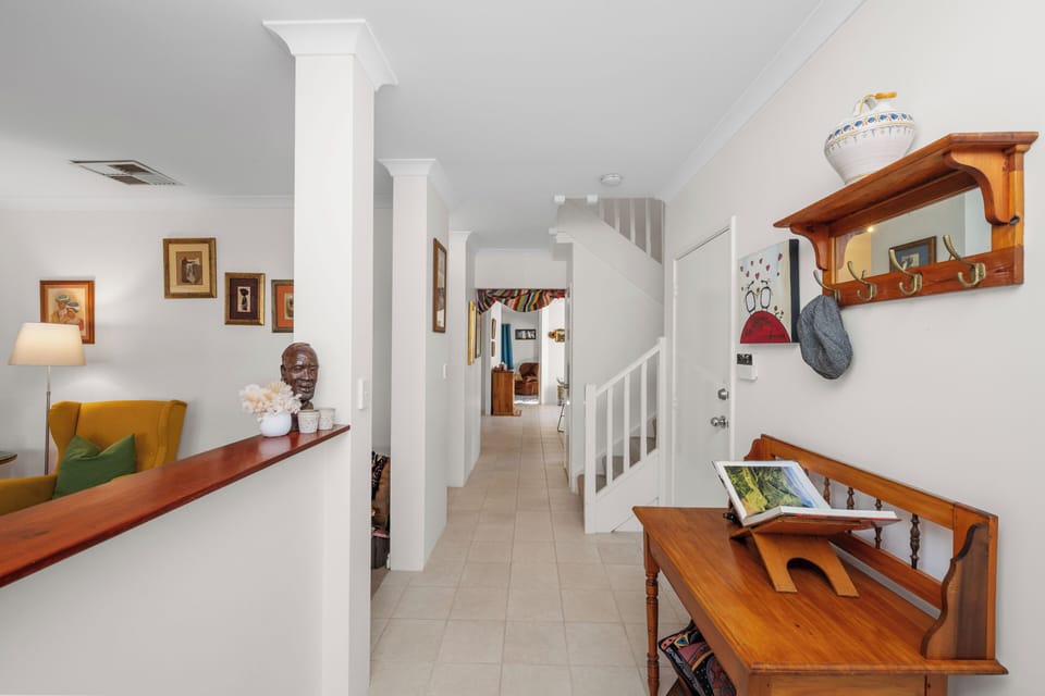 Step inside and feel instantly welcomed by this bright, spacious entryway that sets a warm tone for the home.