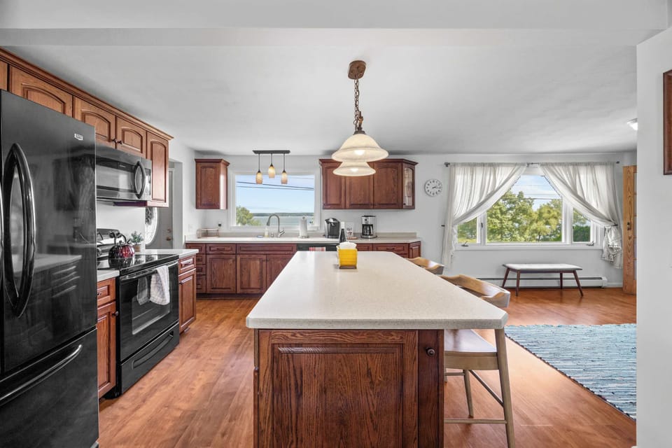 Gather around the kitchen island for drinks, snacks, and conversation.