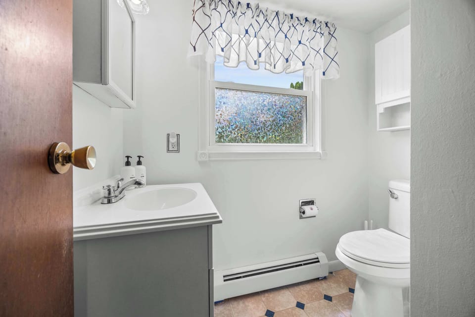 Convenient main-level half bathroom.
