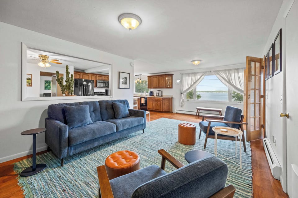 Spacious living room with comfortable seating and plenty of natural light.