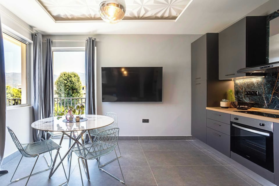Stylish dining area beside the balcony