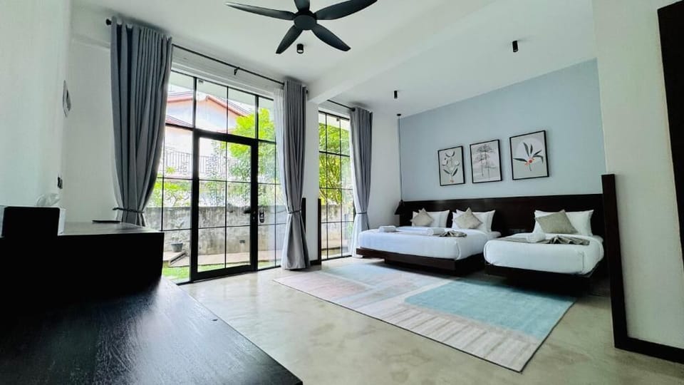 Family Room, Patio, Garden View | In-room safe, blackout drapes, iron/ironing board, WiFi (free)