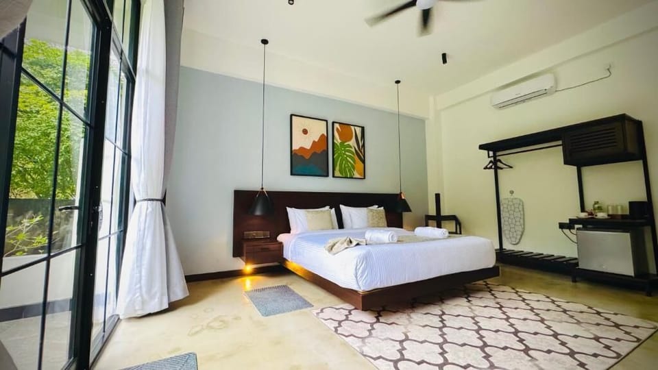 Double Room, Patio, Garden View | In-room safe, blackout drapes, iron/ironing board, WiFi (free)