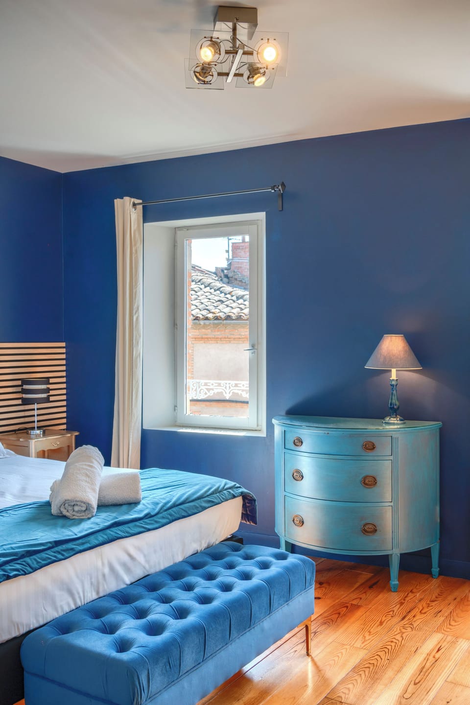 Suite Marguerite, street view | In-room safe, desk, laptop workspace, blackout drapes