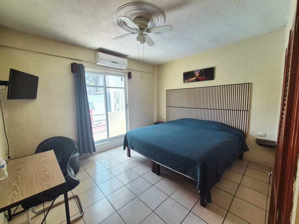 Comfort Double Room Single Use, 1 King Bed, Balcony, Poolside | Desk, laptop workspace, WiFi (free)