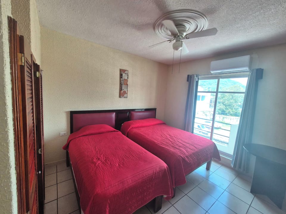 Basic Twin Room, 2 Twin Beds, Pool Access, Poolside | Desk, laptop workspace, WiFi (free)