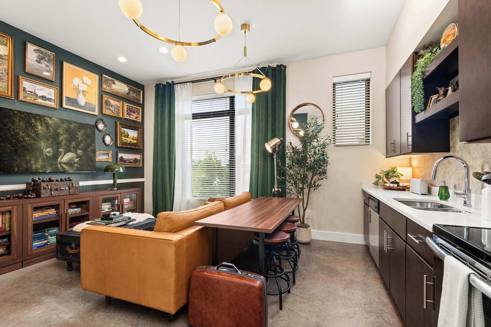 Dining table for four with the kitchen alongside