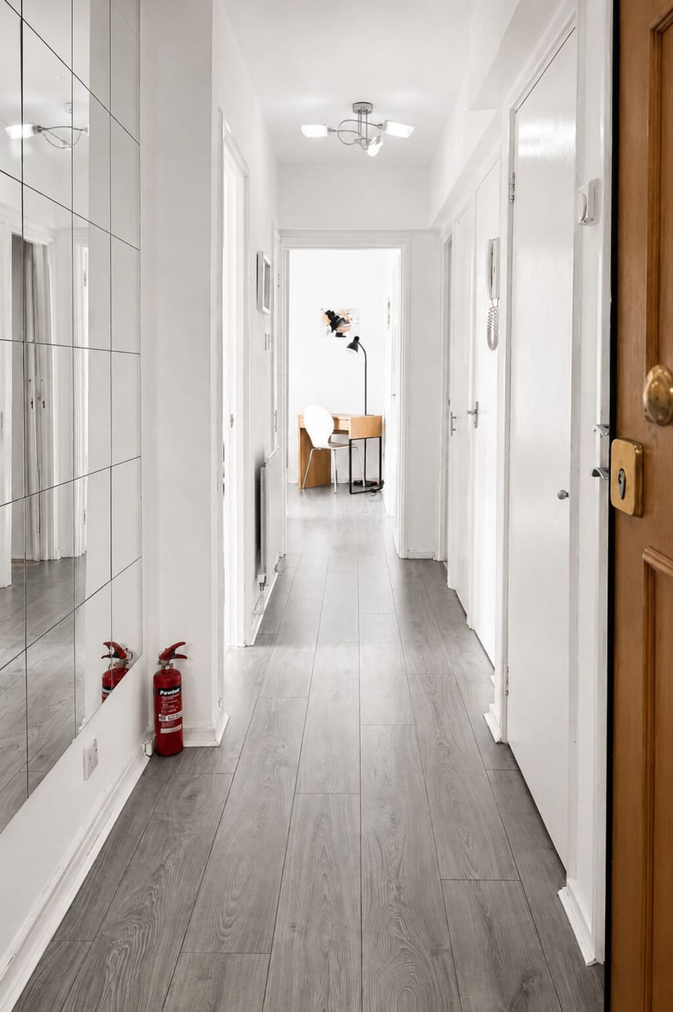 Hallway connecting the bedroom, bathroom and main living areas