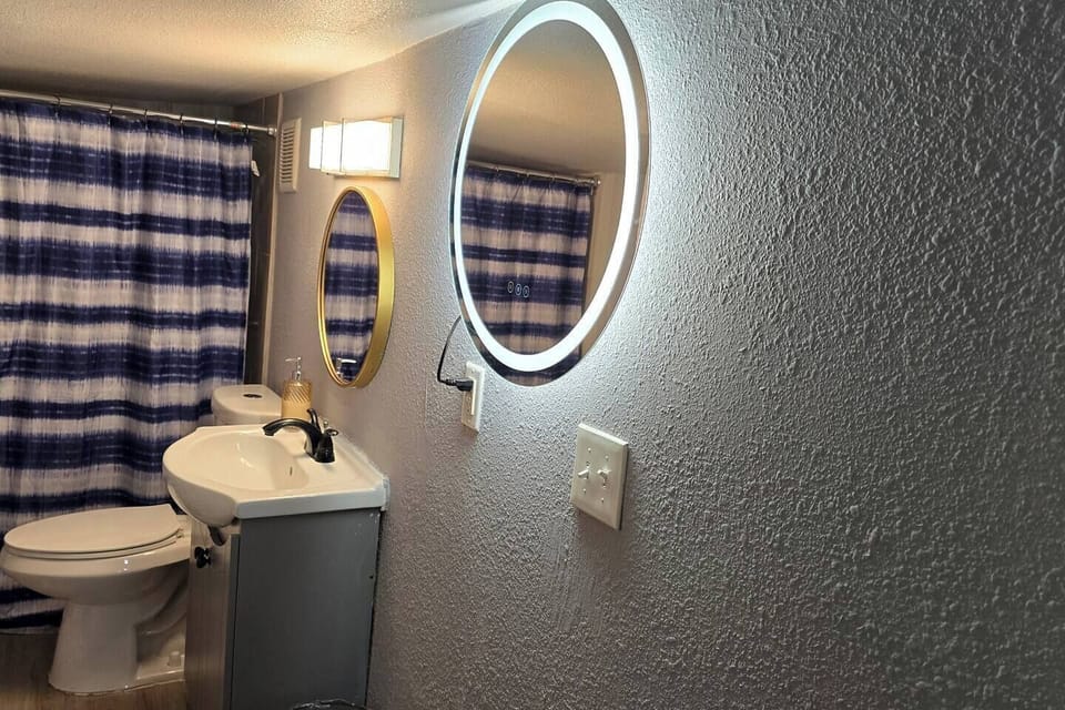 Enjoy getting ready with a 3 tone led large mirror 
