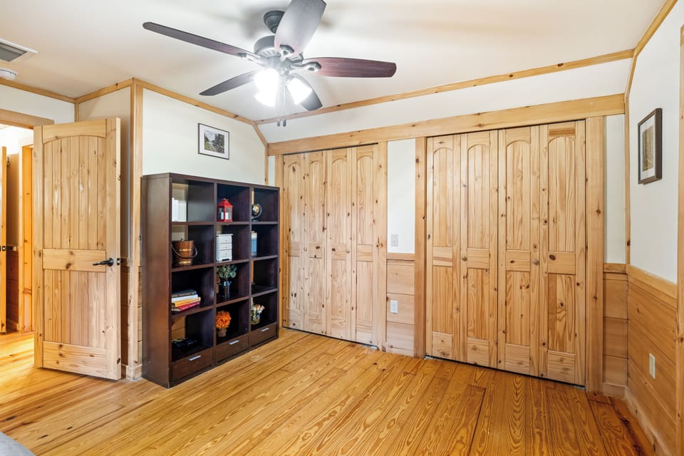 double closets in the bedroom with one double bed