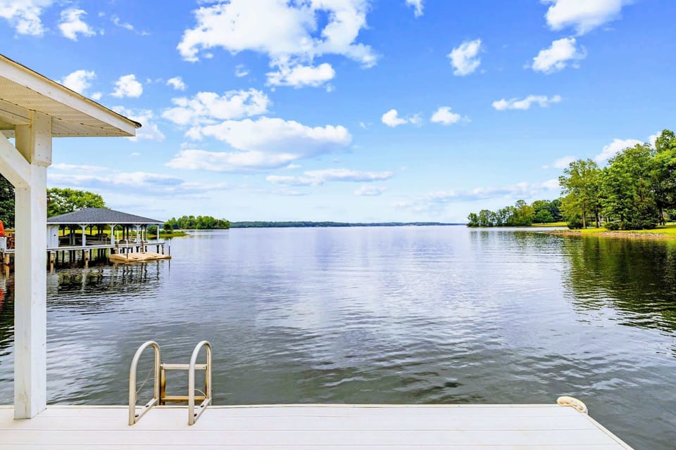 Dock & Boathouse - A swim ladder and glassy water invite an easy dip straight off the dock.