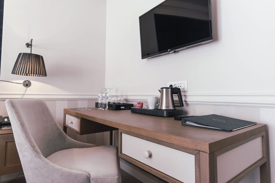 Deluxe Double or Twin Room, Sea View | Minibar, in-room safe, desk, laptop workspace