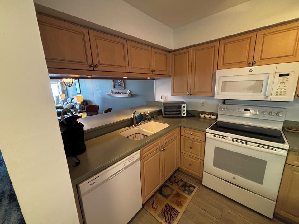 Fully equipped kitchen opens to Dining Room