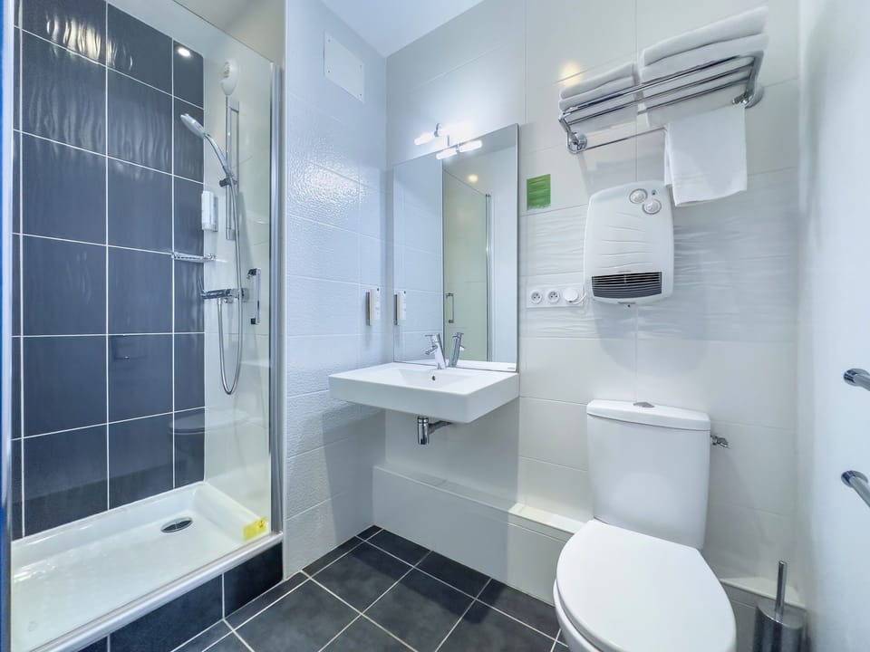 Shower, free toiletries, hair dryer, towels