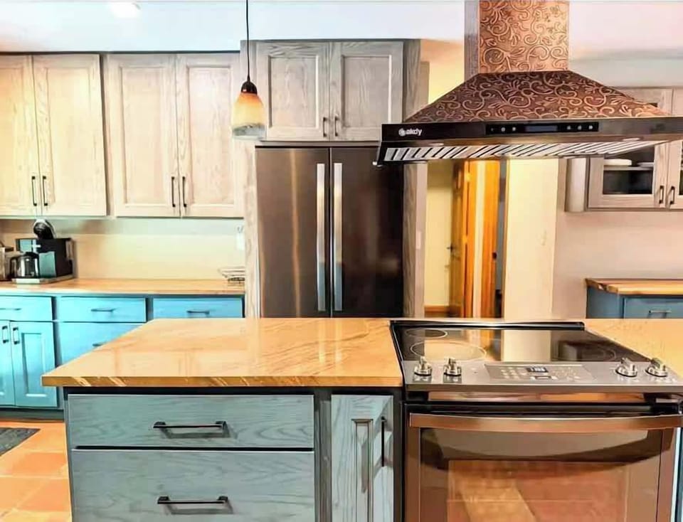 Fully equipped gourmet kitchen with coffee station for easy mornings