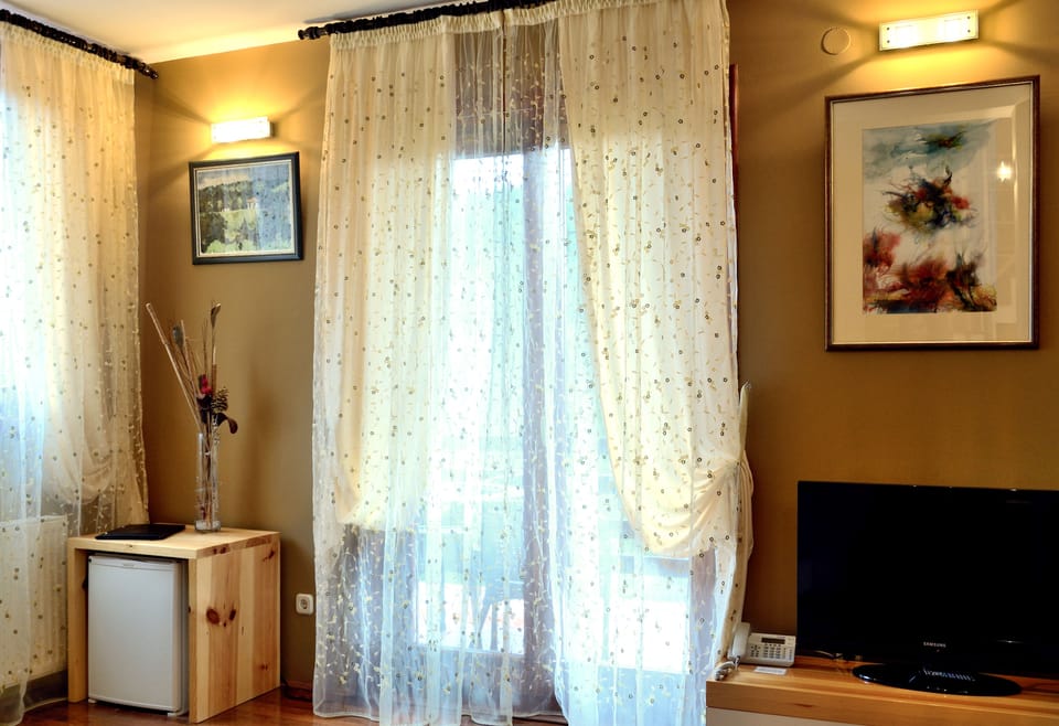 Family Villa (Apartment) | Living room | Flat-screen TV