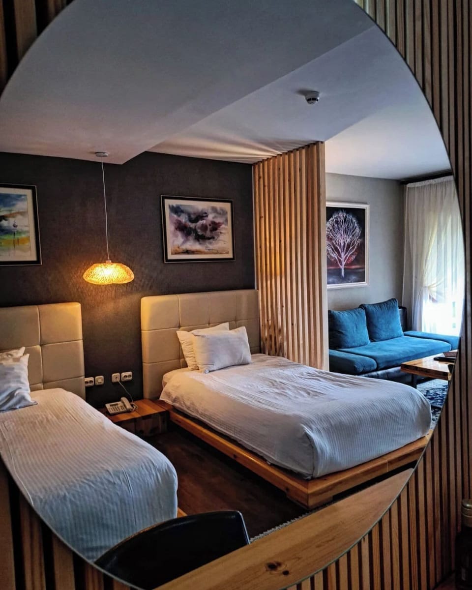 Deluxe Double or Twin Room, Pool View | Minibar, in-room safe, free WiFi, bed sheets