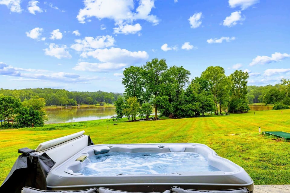 Hot Tub - Warm jets, open sky, and the cove glittering just beyond the lawn, this is how evenings should end.