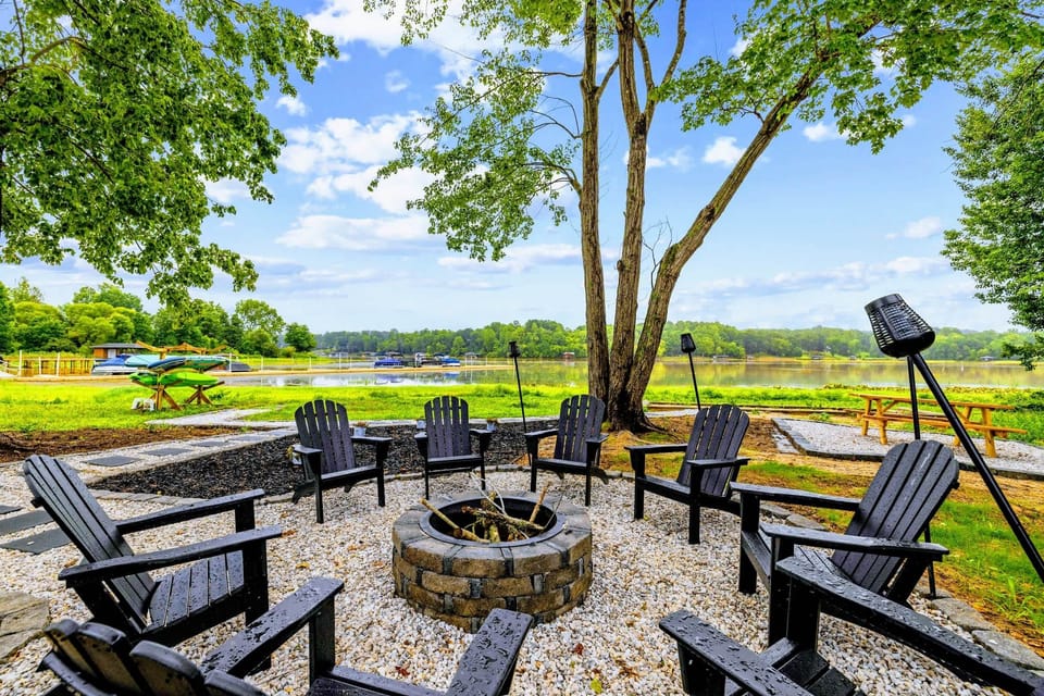 Fire Pit - From your chair by the flames, watch boats drift past the docks across the sparkling cove.