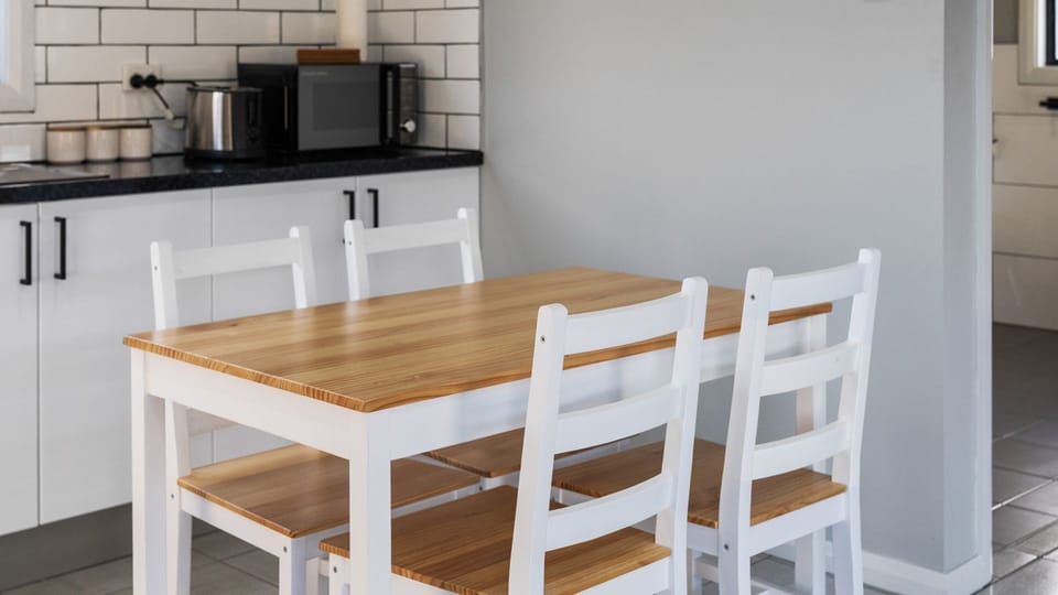Dining space for four, perfect for meals, work or planning your day.