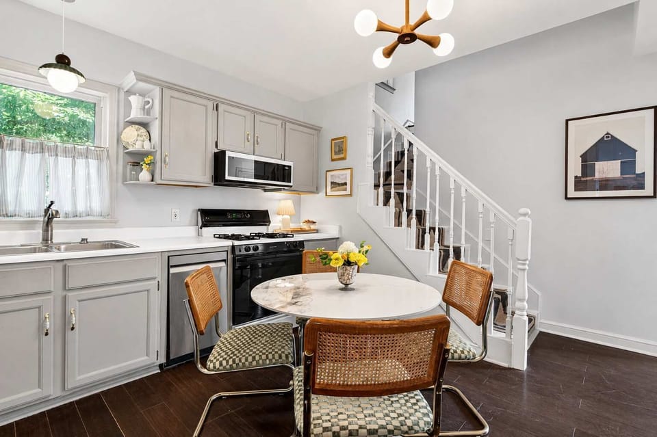 Kitchen: Enjoy the convenience of a fully equipped kitchen paired with a cozy dining area, creating the perfect space for cooking, sharing meals, and making lasting memories together.