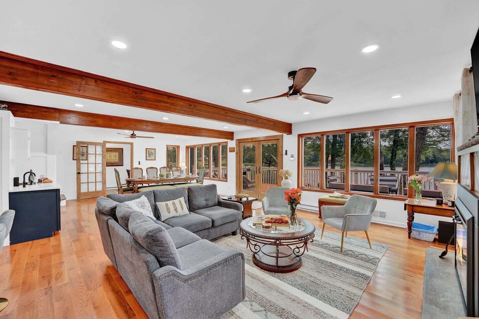 Connected living and dining areas with plenty of room to move and relax.
