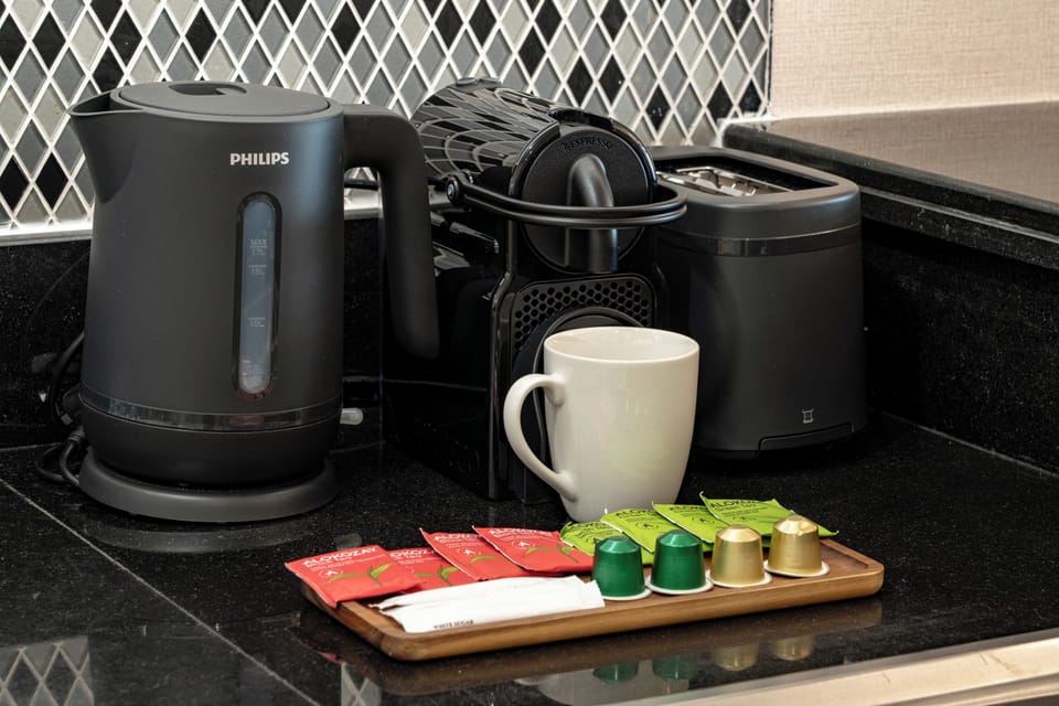 Deluxe Apartment, City View | Coffee and/or coffee maker