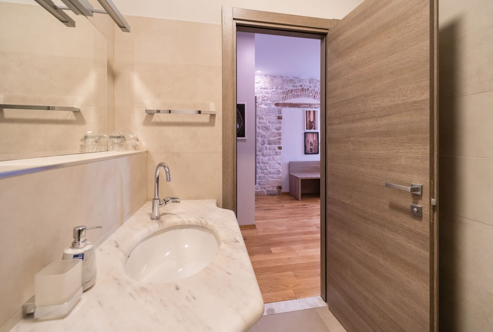 Triple Room | Bathroom | Shower, hair dryer, towels