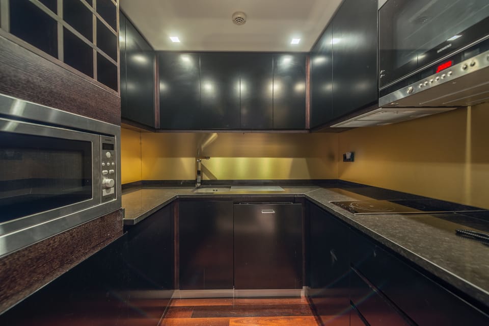 Penthouse, Kitchenette, River View | Minibar, in-room safe, desk, blackout drapes