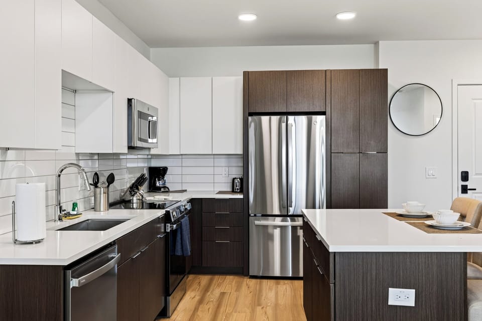 Modern chef's kitchen with premium appliances and ample workspace.