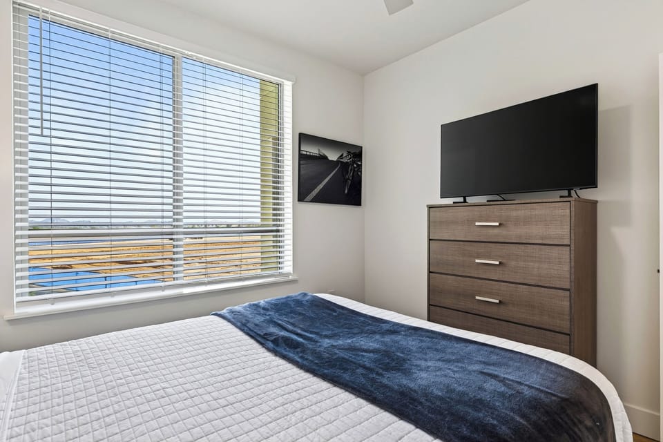 Cozy bedroom with crisp linens and stylish finishes.