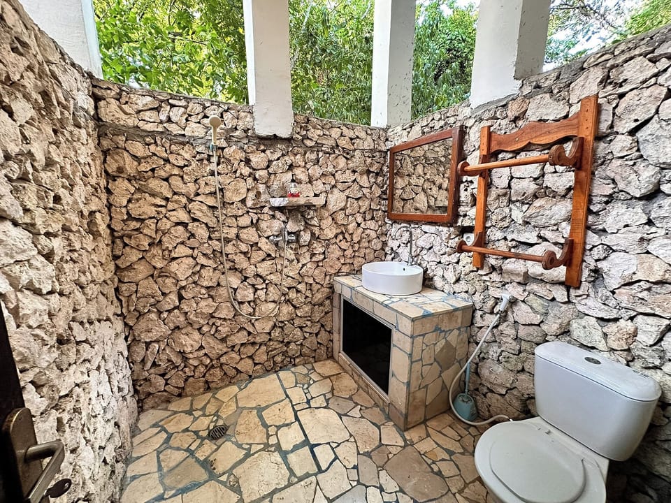 Standard Bungalow, Garden View | Bathroom | Shower, hair dryer (on request), towels