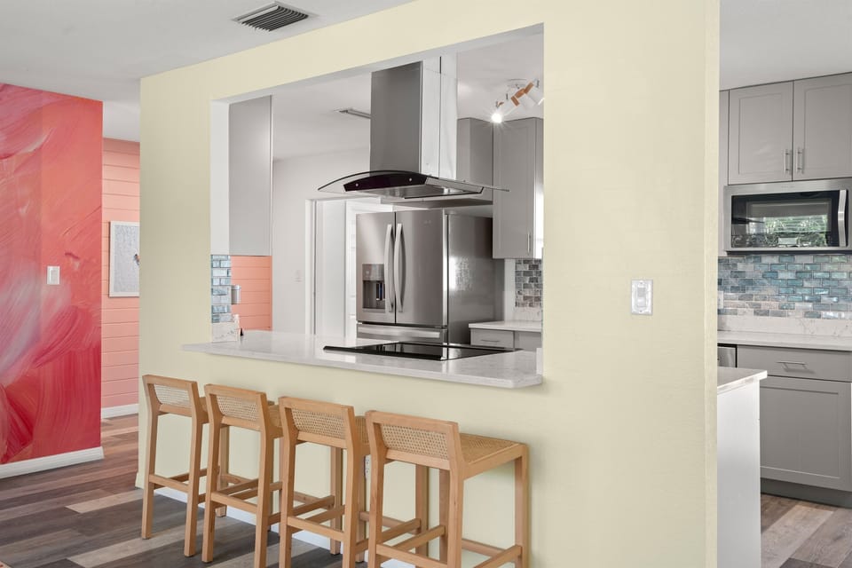 Imagine enjoying your morning coffee or a meal on the kitchen island.