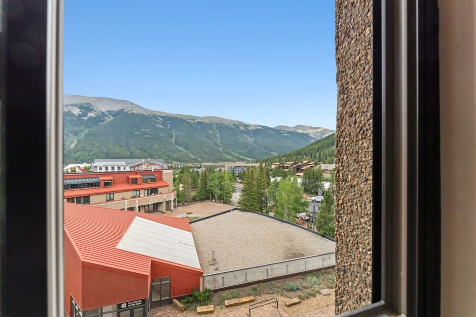 Take in stunning mountain scenery framed right from your window—evergreen forests and dramatic peaks set the scene for your mountain getaway.
