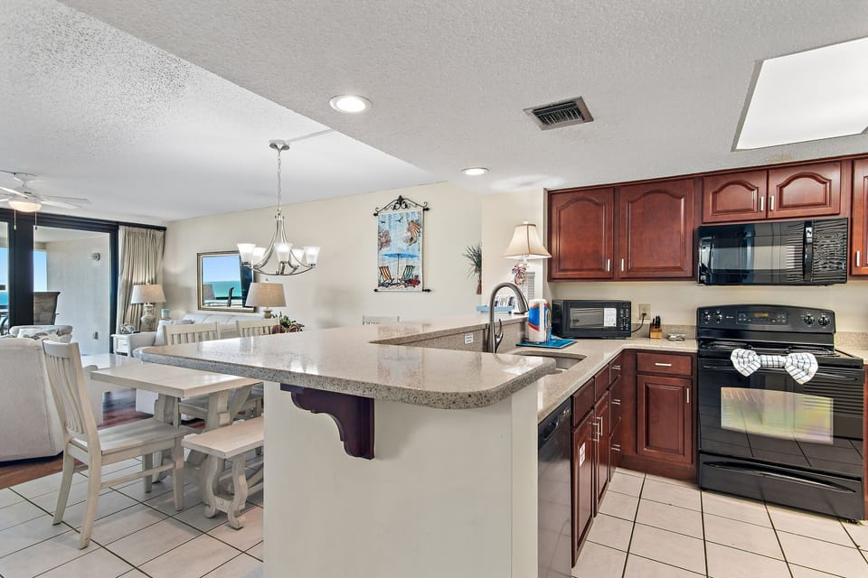 Open-concept kitchen and dining area makes it easy to stay connected with your group