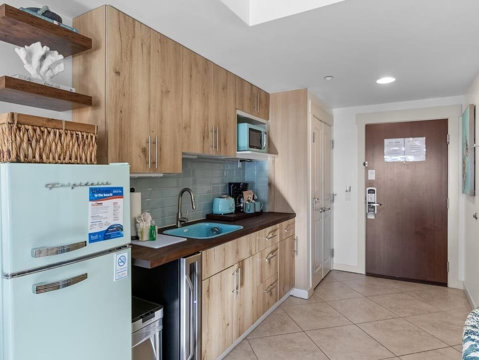 Functional kitchenette with everything needed for a beach getaway