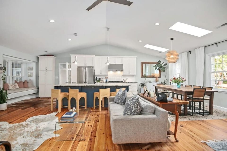 An open-concept dream where cooking, catching up, and kicking back all flow together - those skylights keep the Charleston sunshine pouring in all day long.