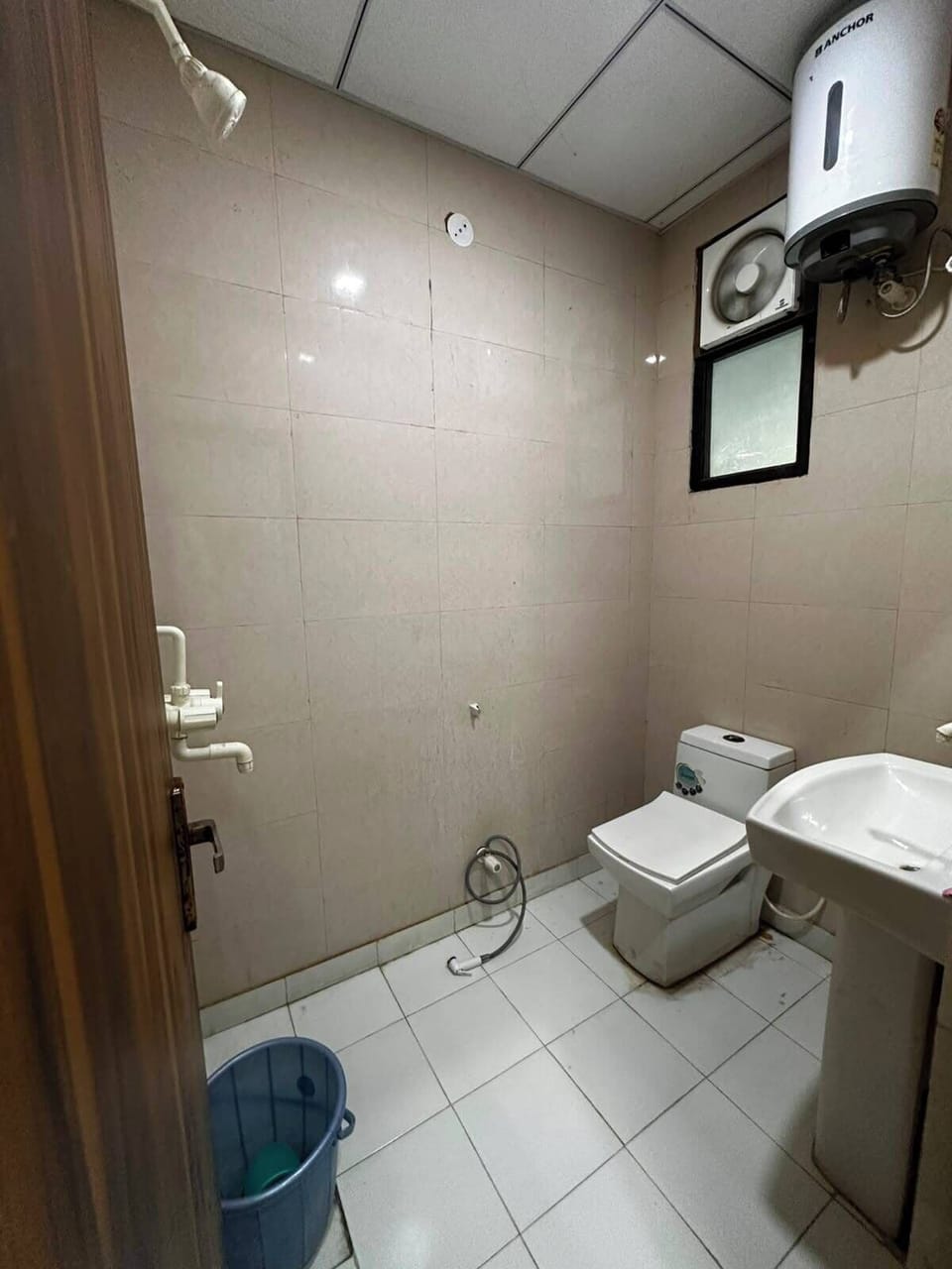 Shower, towels, toilet paper