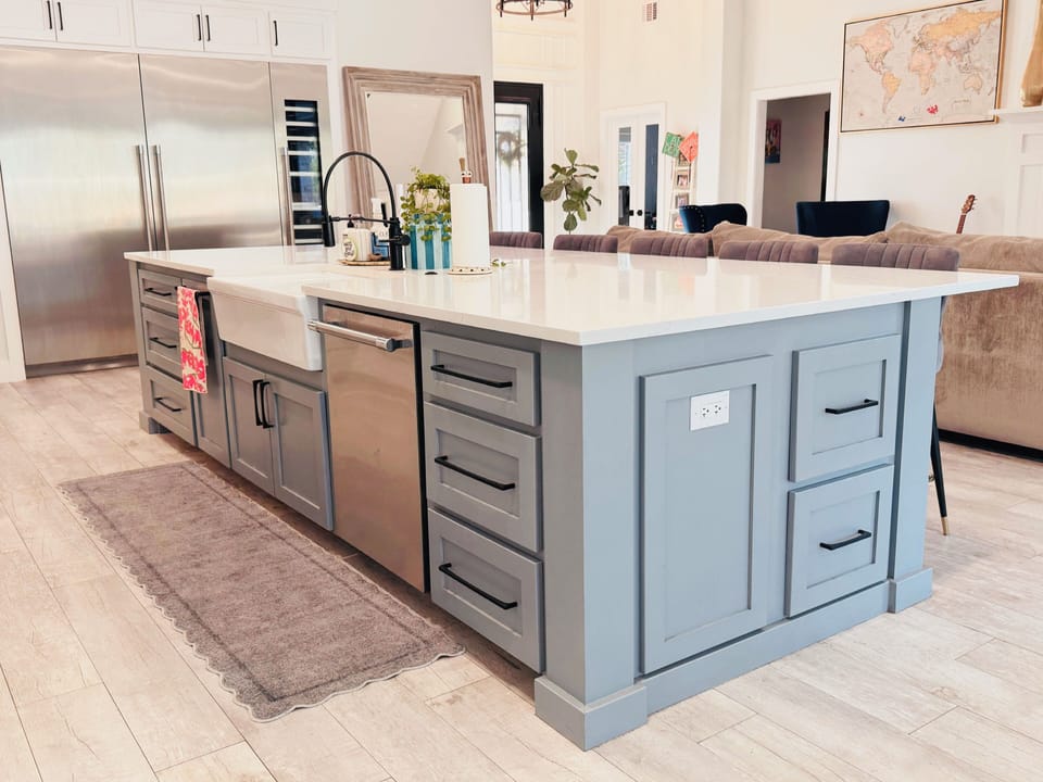 Massive kitchen island featuring upgraded commercial appliances & so much more.