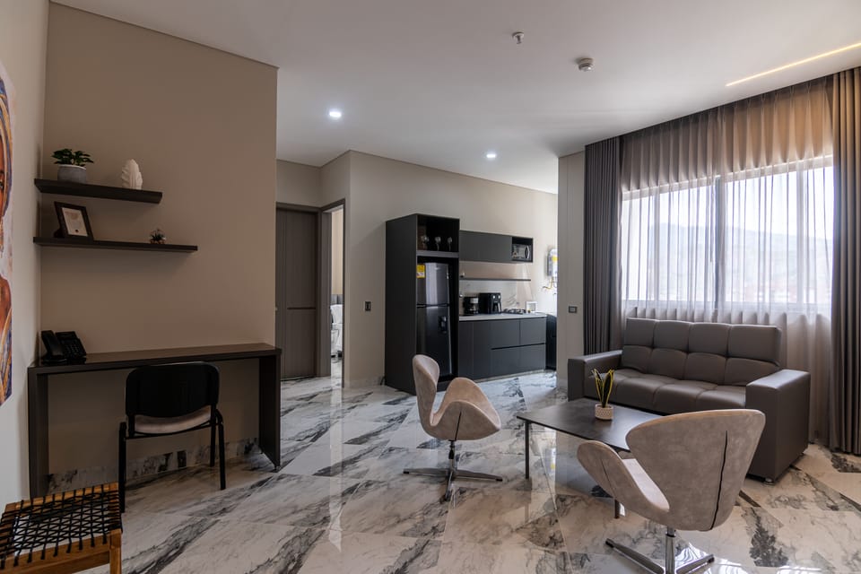 Deluxe Apartment, 2 Bedrooms, 2 Bathrooms, City View | Living room | 55-inch Smart TV with satellite channels, Netflix, streaming services