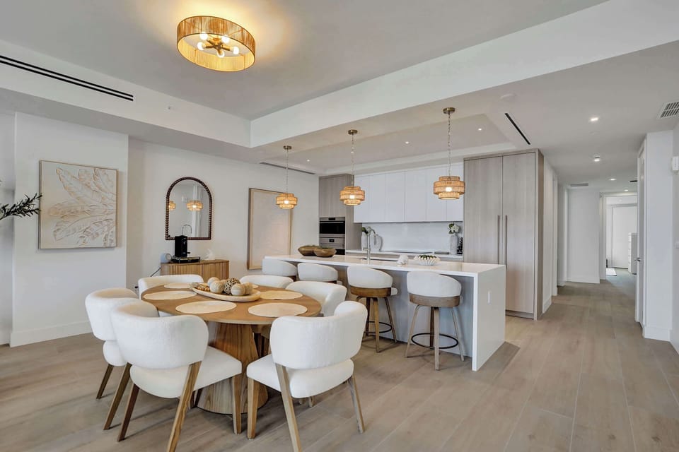 Oval dining table for six with kitchen view