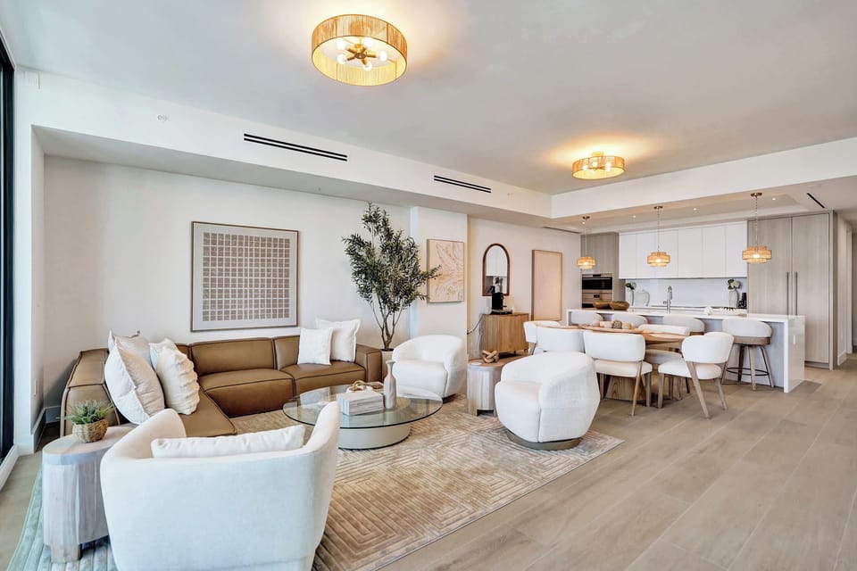 Open-plan living and dining with ocean light