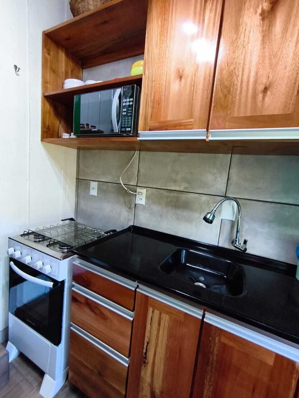 Fridge, microwave, oven, cookware/dishes/utensils