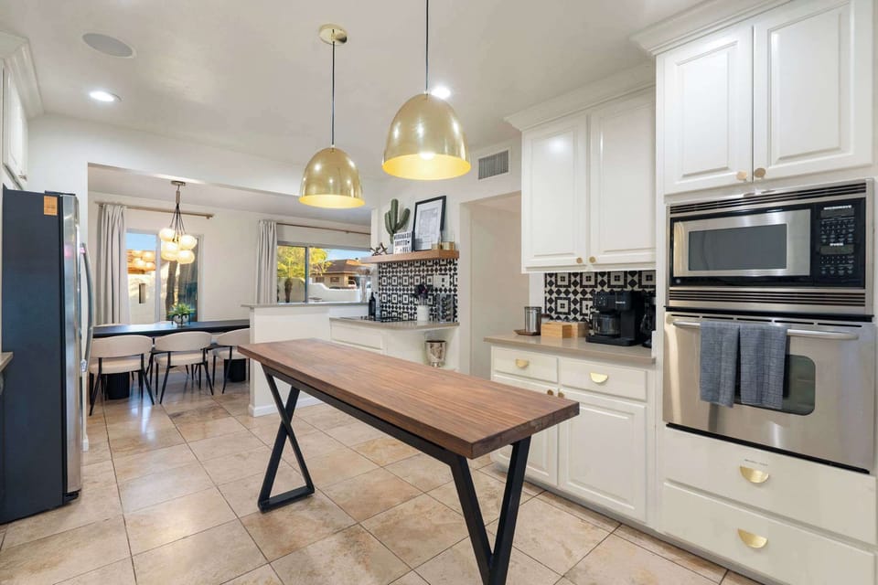 Open kitchen with stainless steel appliances