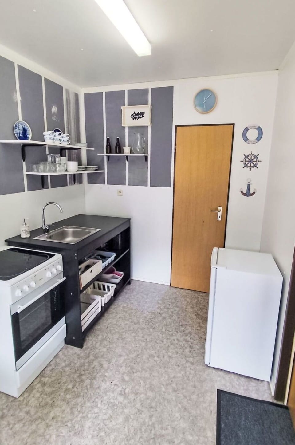 Flooring, Interior Design, Major Appliance, Floor, Furniture, Kitchen Appliance, Lighting, Room, Ceiling, Cabinetry